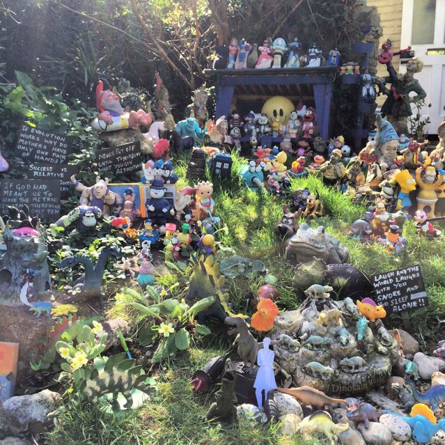 a little inland she walks down a hill and finds a garden of wonders