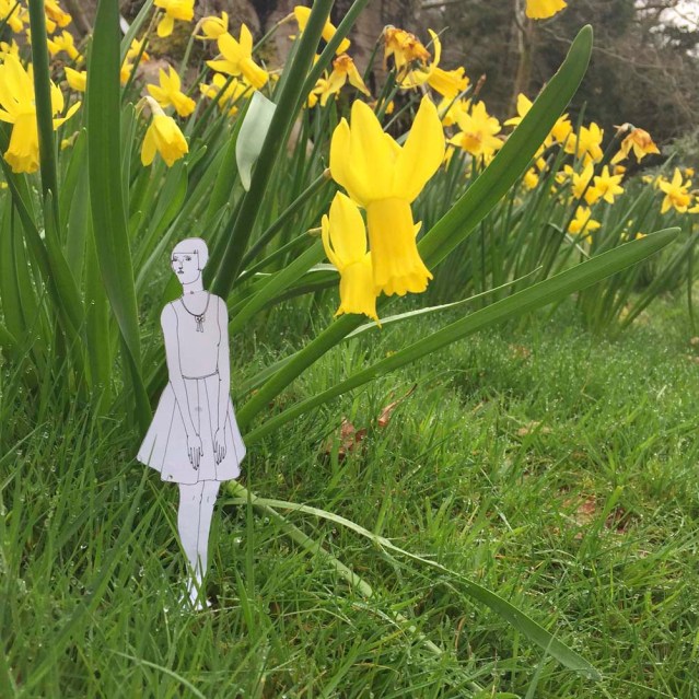 she speaks softly to daffodils