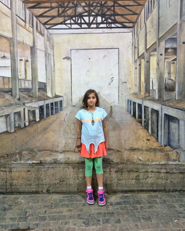 it's like she just popped out of that wall