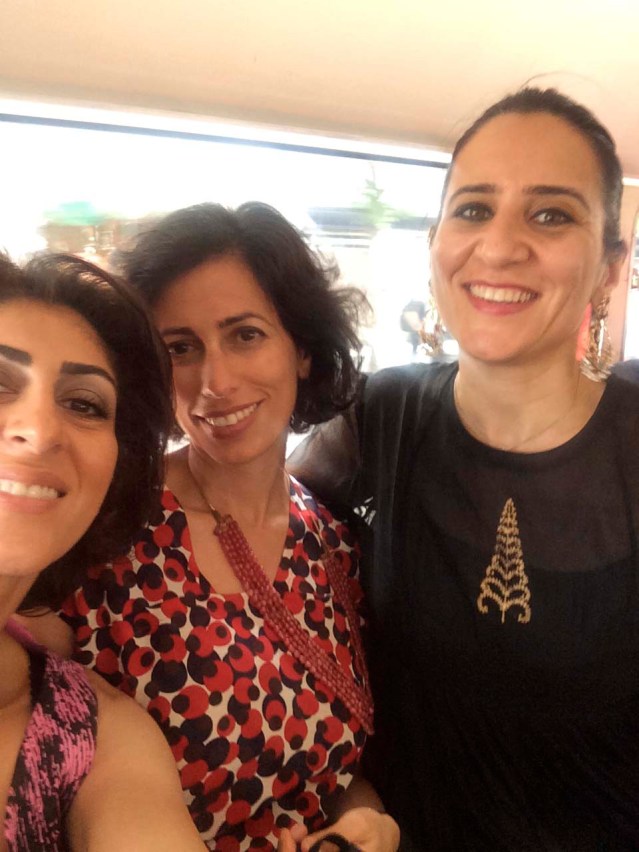 june 27 } wedding day. on the bus from the ceremony, which took place in the chelsea old town hall. my new friend razan, laila and me
