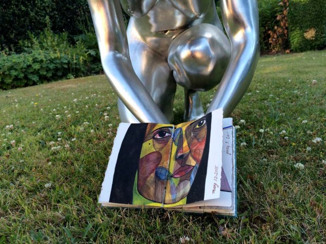 normally she's looking down intently at the grass, but here she's showing off my painting