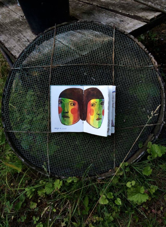 on my way down to the greenhouses my rainbow girls become attached to a garden sieve