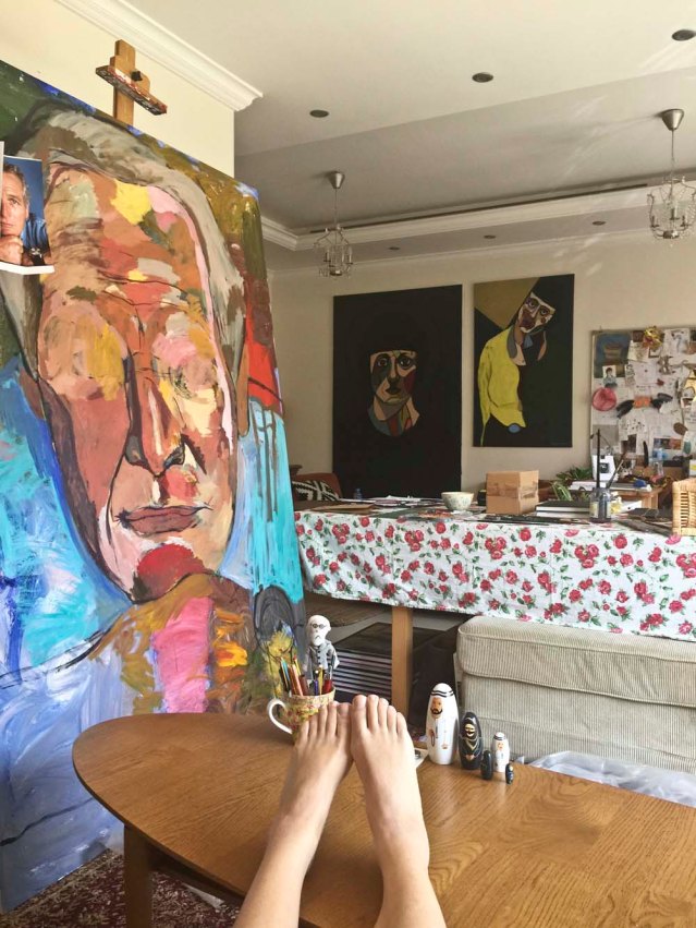 relaxing with sigmund, paul and a wooden qatari family of five