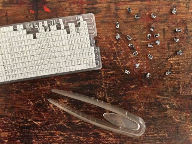 i wanted to customize a stamp with an obsolete mantra, so i used these teeny weeny letters. it was a pain, and i had to improvise when i ran out of e's and a's