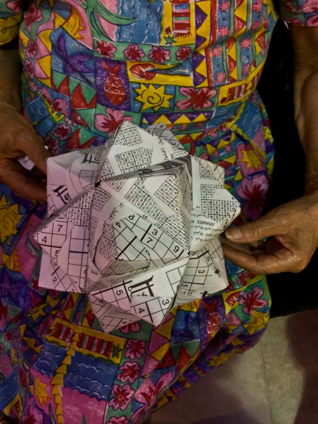 at night i get jana, yasmine and one of our guests to create this polyhedron. and i must thank (and apologize to) my mom for providing the paper