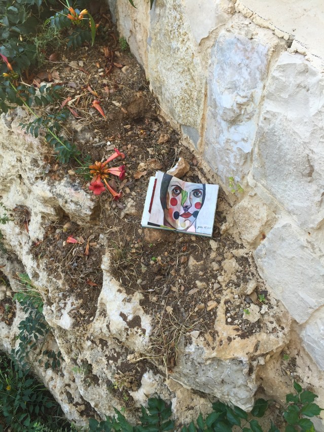 resting with the dead leaves and bloom