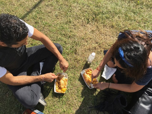 tareq and yasmine enjoy a post-prandial meal of fish and chips. i had a swirly ice-cream cone and the rest of yasmine's fries. i know, gross