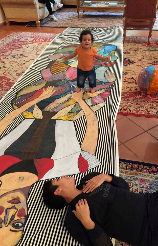 she got baby k's seal of approval. he really loved the colors and even attempted to pick up one of the polyhedra i painted