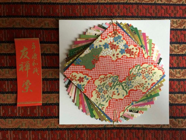 i unpack my new origami paper i bought from green & stone's. as pretty as it looks, the texture is not suited for folding