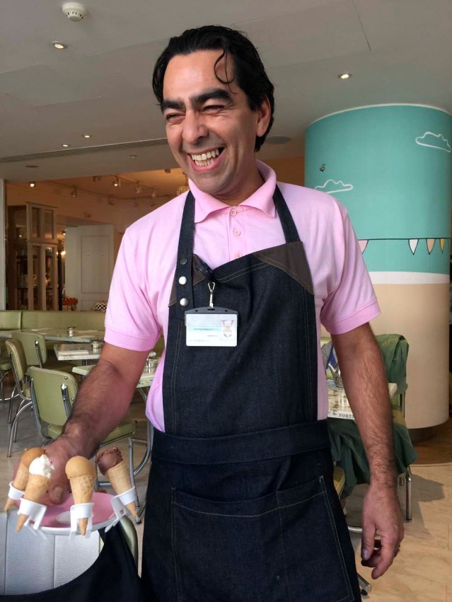 i want one so i ask this lovely argentinian man for one and he brings us four. we don't complain and scarf them all down