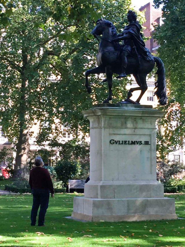 we visit many galleries, meet some of his art world friends and even pop in on a couple of auctions at christie's and sotheby's. but it's this man staring at this statue for minutes that impacts me the most