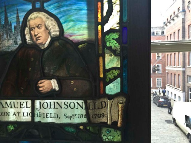 dr. johnson's strategic stained glass window allows him a great vantage point. he has two views: one onto gough square and the other into this alcove