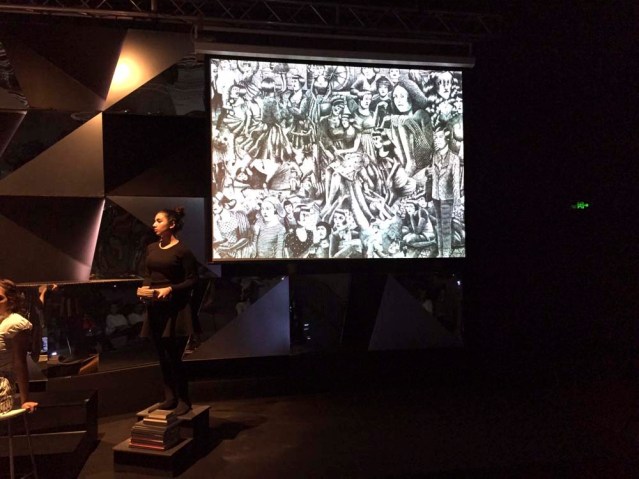 zainab and a storybook drawing. photo by laura boushnak